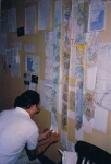Dennis_Darach_helping_cutting_out_the_maps